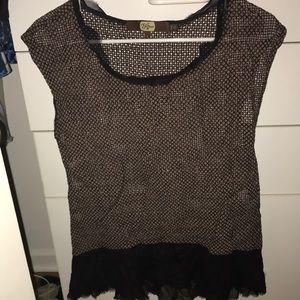 Small textured sleeveless brown shirt